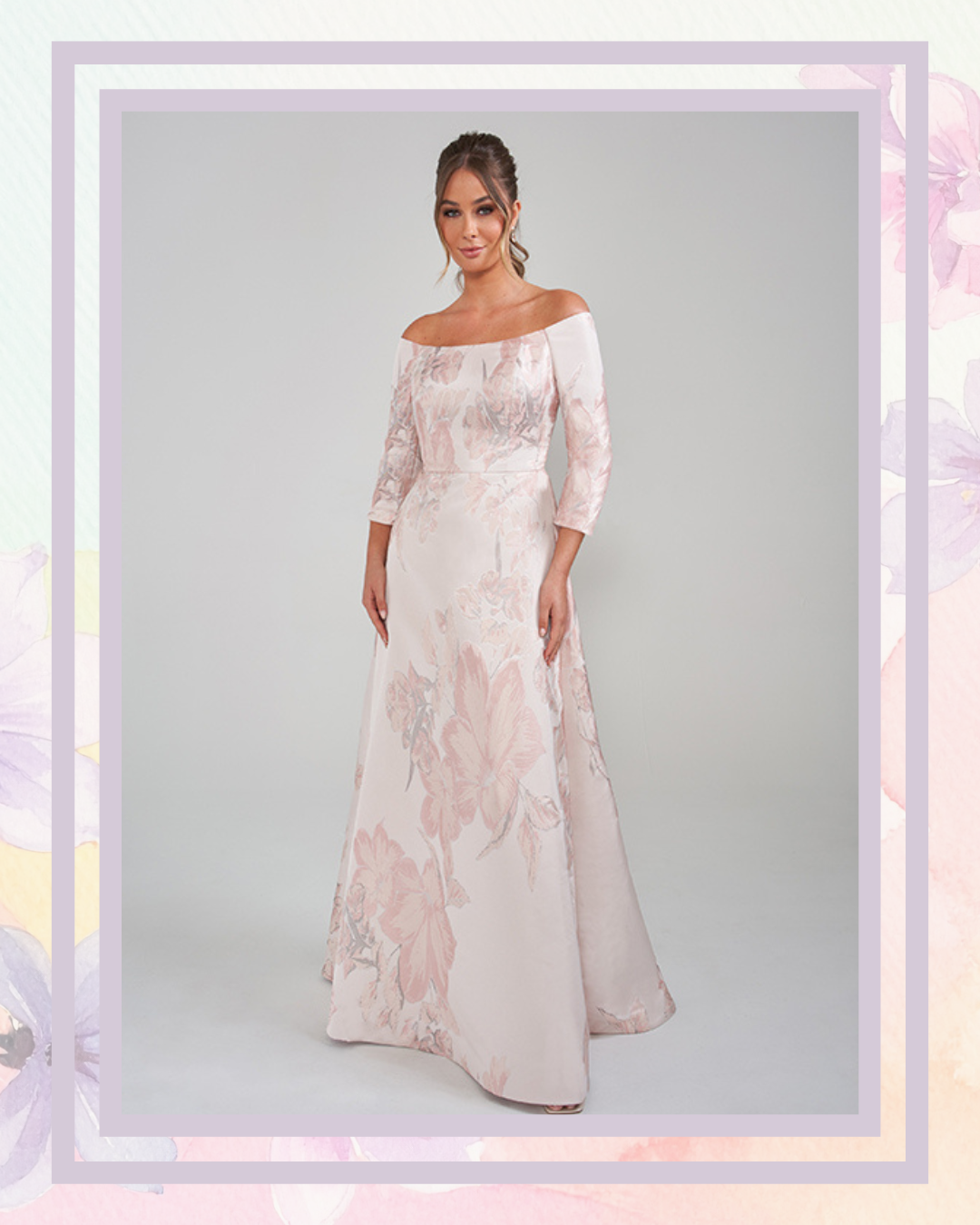 A woman wearing an elegant off-the-shoulder floral gown, standing against a neutral background.