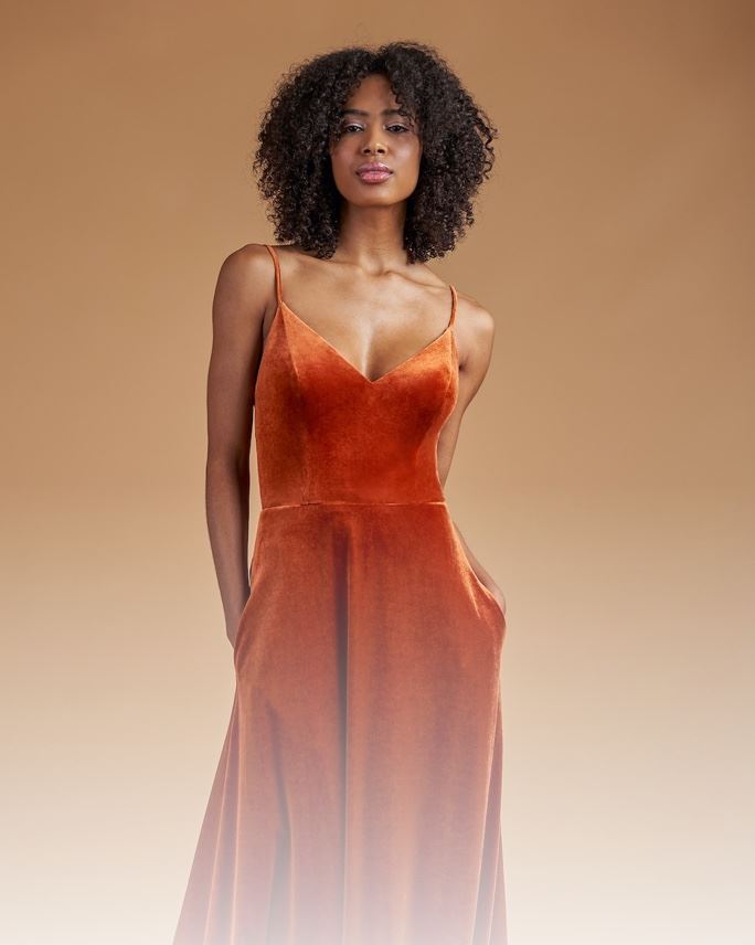 Model wearing a bridesmaids Collection Gown by Wendy's Bridal
