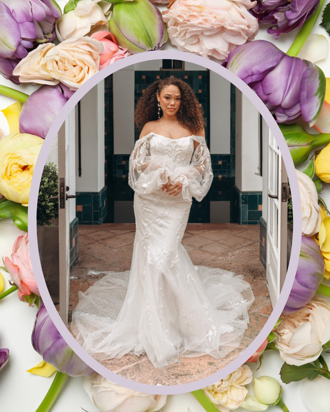 A woman in a white wedding dress stands in an elegant setting surrounded by colorful flowers.