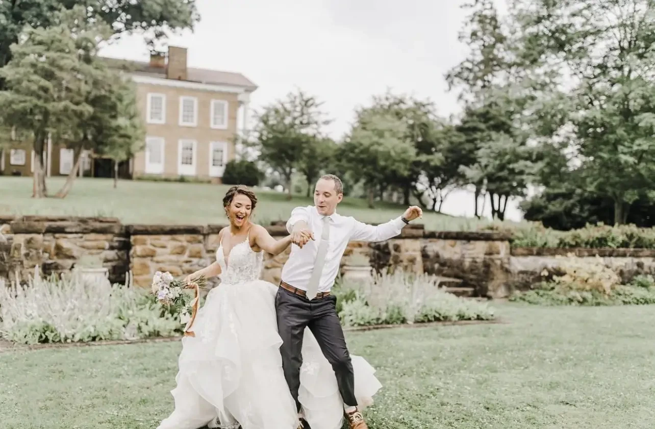 Photo of the bride and groom dancing