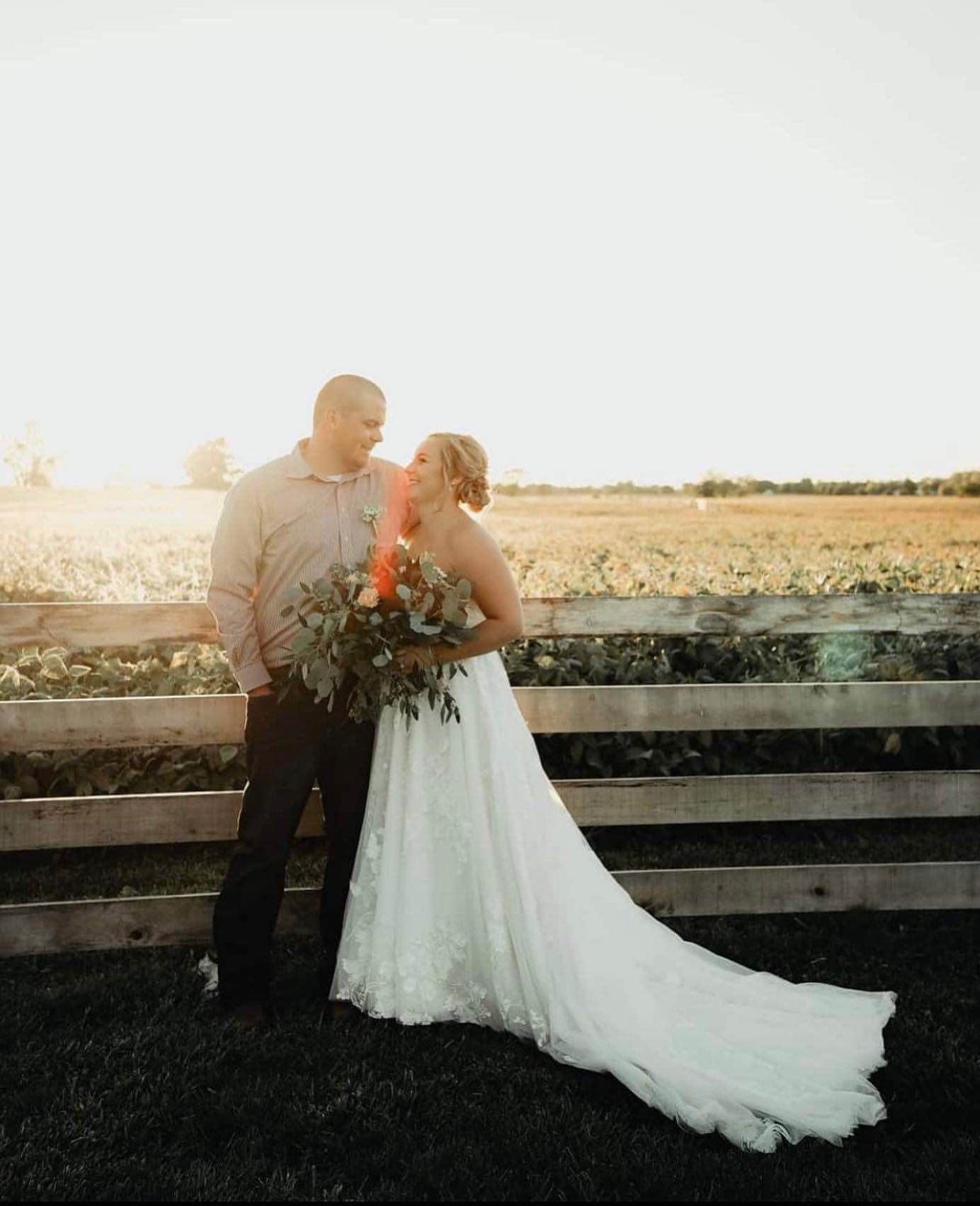 Photo of the real bride and groom in the field